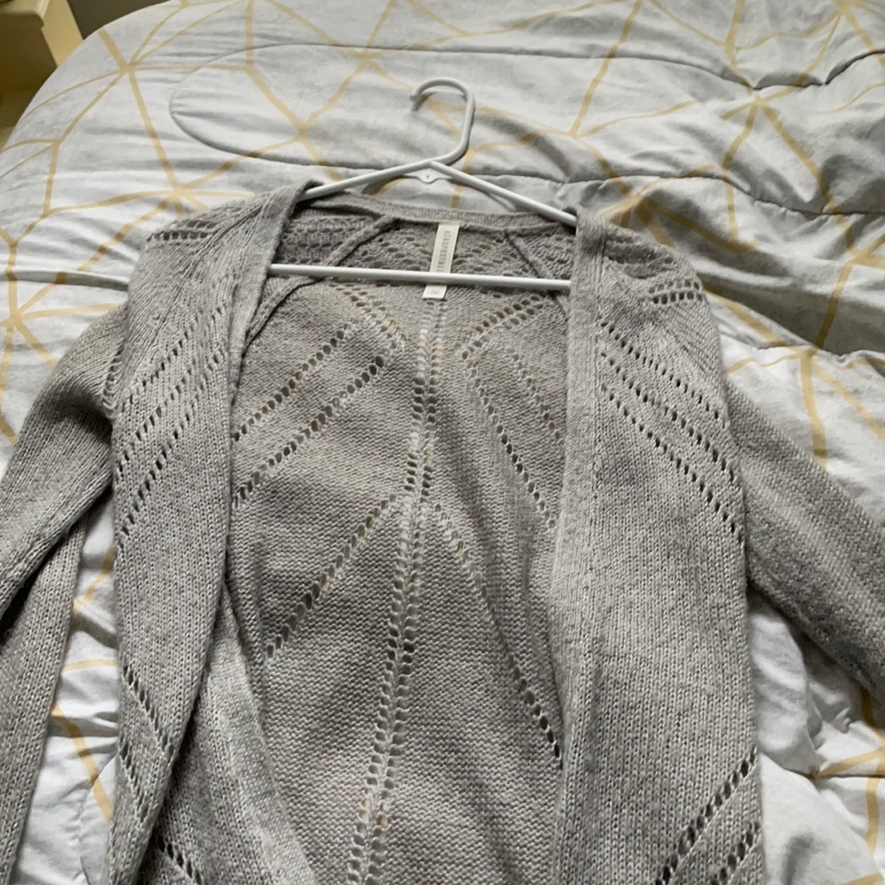 Gray sweater with a nice design.